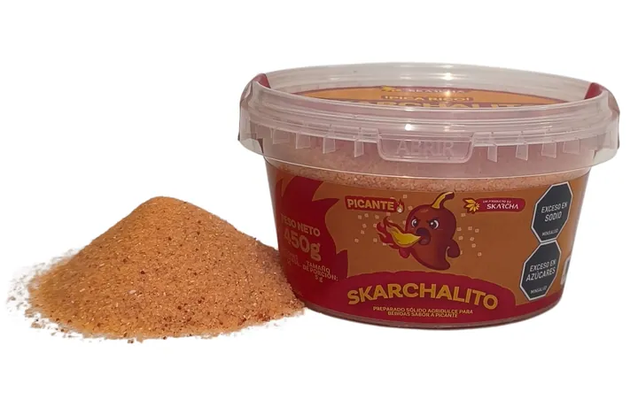 Skarchalito 450 g, tarro con el polvo picante al lado